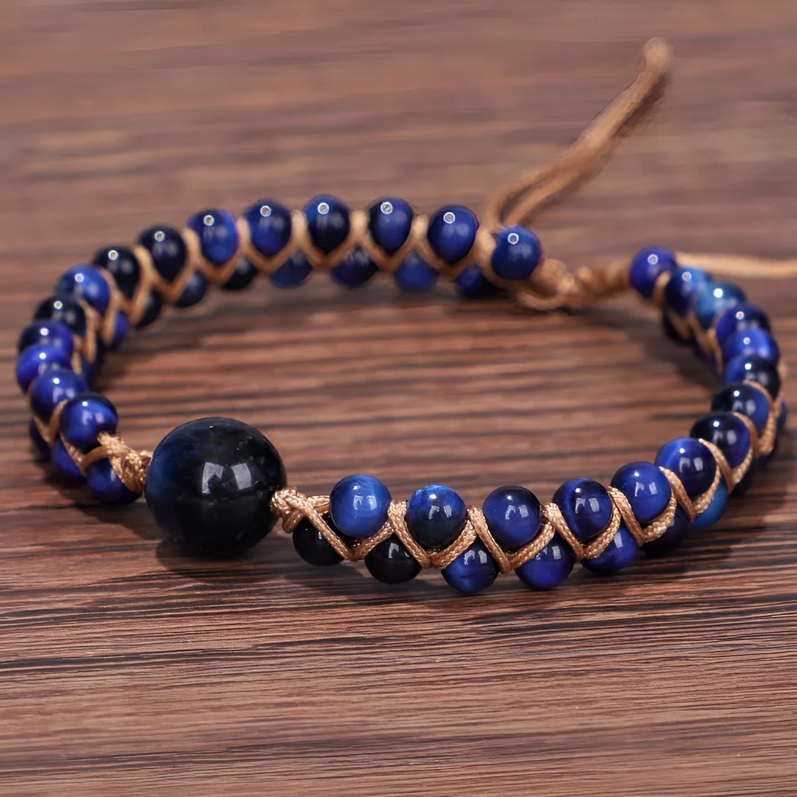 Handmade woven geometric pull bracelet with adjustable sliding knot in blue tiger eye stone