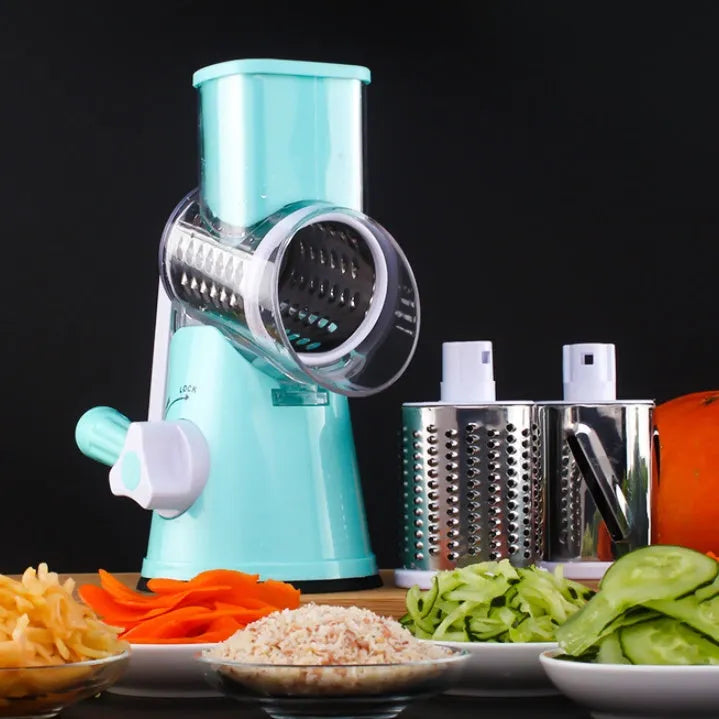 Blue manual mandoline vegetable slicer with stainless steel blade on a kitchen counter.