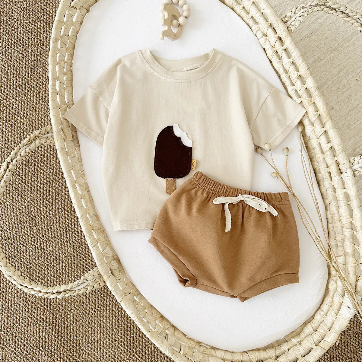 Girls' olive green cotton shorts suit set with ice cream patch detail on short sleeve shirt.