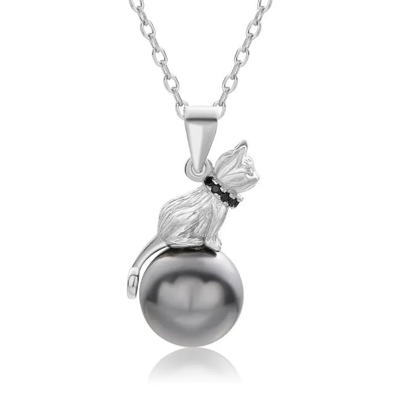 925 sterling silver cat pendant necklace on a clavicle-length chain, showing the detailed feline charm.