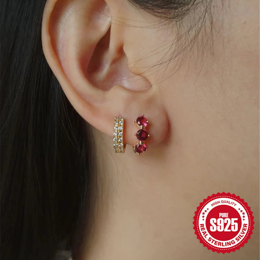 A pair of S925 sterling silver geometric sunflower earrings with inlaid golden-three diamonds zircon stones.