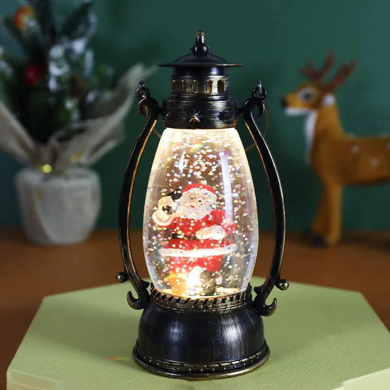 Crystal ball oil lamp Christmas ornament with light-emitting snowman scene on desktop