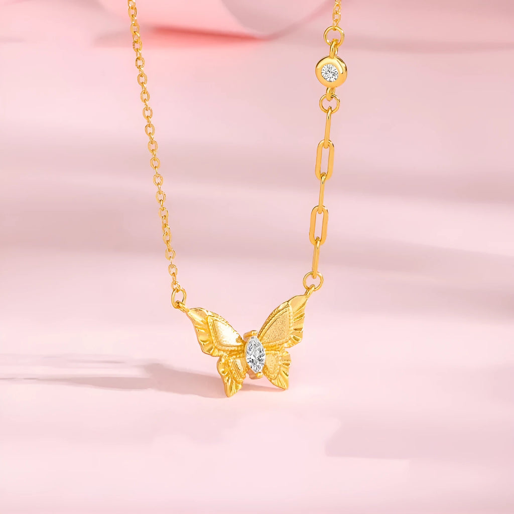 S925 sterling silver brushed butterfly necklace with asymmetric diamond detail on O-ring chain, yellow gold colour