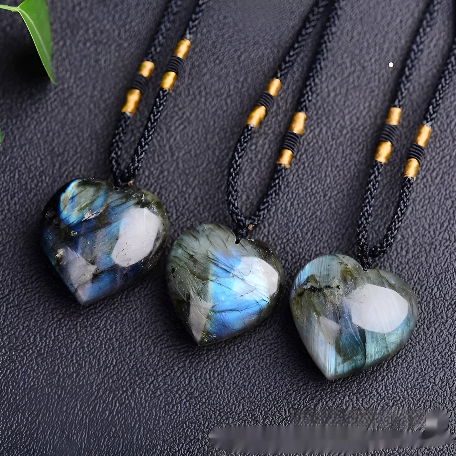 Blue natural Labradorite and Moonstone geometric heart of the ocean pendant necklace on a chain.