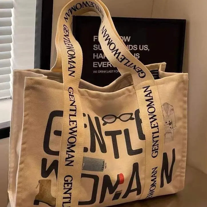 Canvas shoulder tote bag with printed design, large capacity for shopping and travel