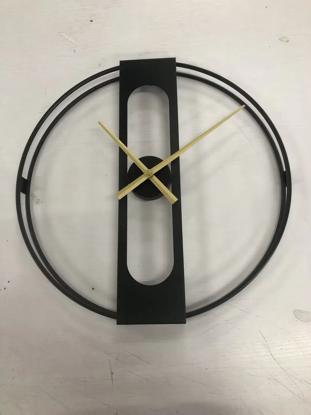 Round metal wall clock in black and gold finish options, 50cm diameter analogue face