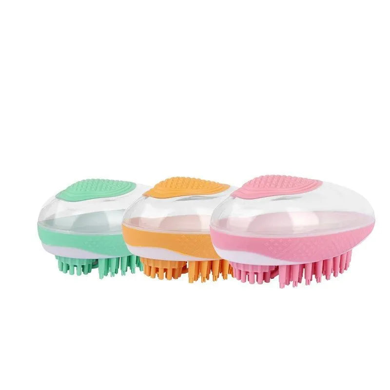 2-in-1 pet bath brush with soft silicone bristles, shampoo reservoir, and non-slip grip in pink