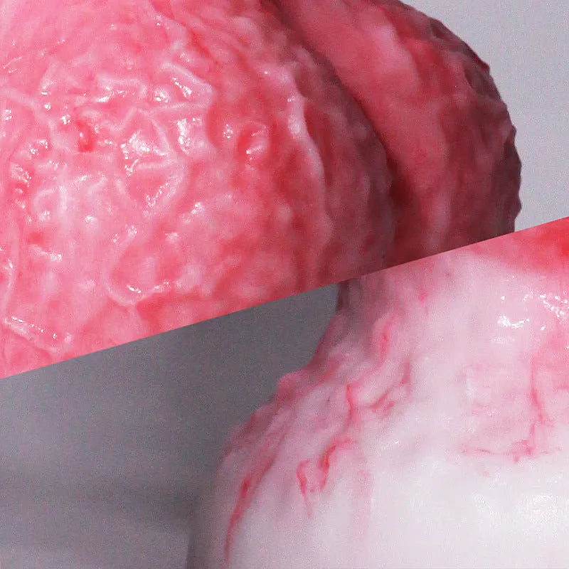 Pink Berserker shaped penis masturbation device for women in platinum silicone.
