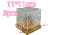 LED water ripple projection night light with remote control on wooden table