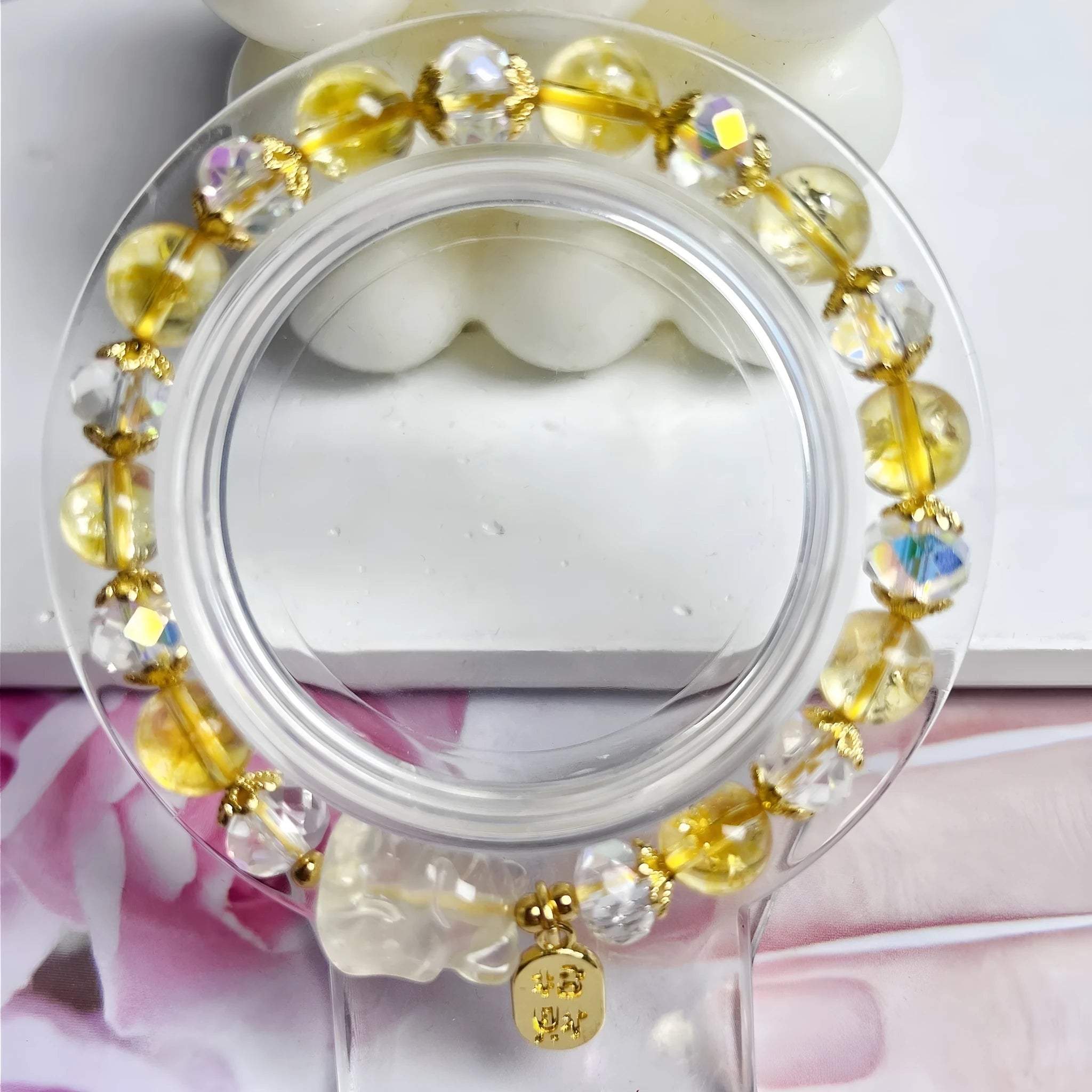Handmade adjustable bracelet with a natural citrine nine-tail fox charm on a silver-tone chain.