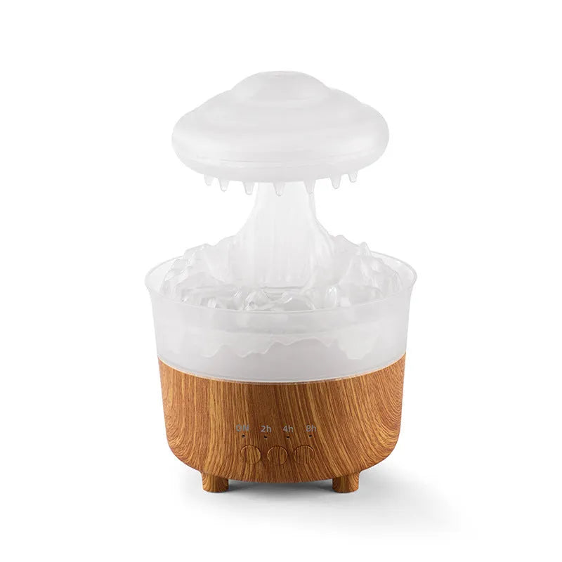 Wood grain finished rain cloud humidifier diffuser with coloured LED night light on table