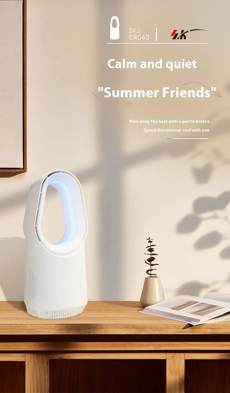 White bladeless tower fan with touch controls and remote on wooden desk