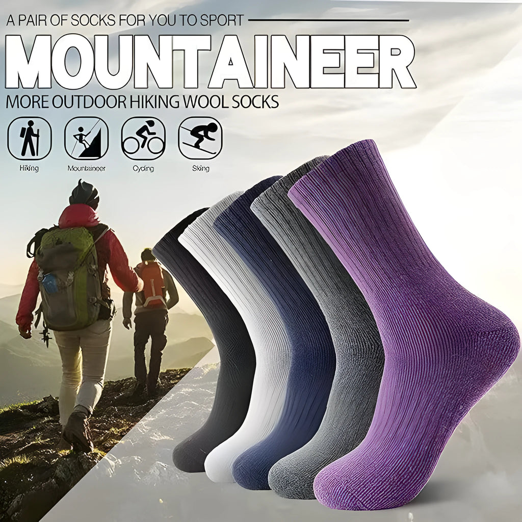 A pair of solid colour wool cashmere blend tube socks with a mid-calf length on a neutral background.