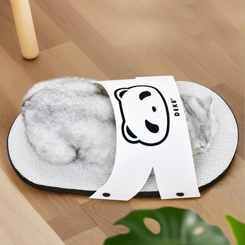 White slipper-style corrugated cardboard cat scratch board on a floor.