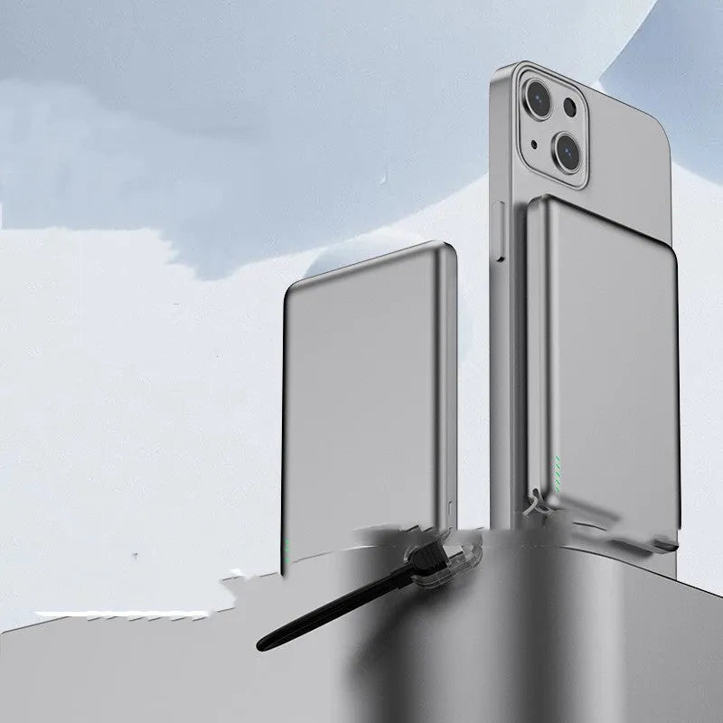 Ultra-thin magnetic wireless power bank with alloy shell, tarnish finish, 8mm thick, on a desk