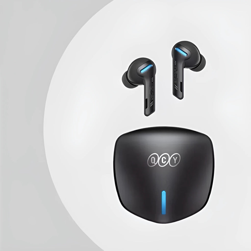 Grey QCY G1 wireless Bluetooth gaming earbuds with charging case and three sizes of silicone ear tips.