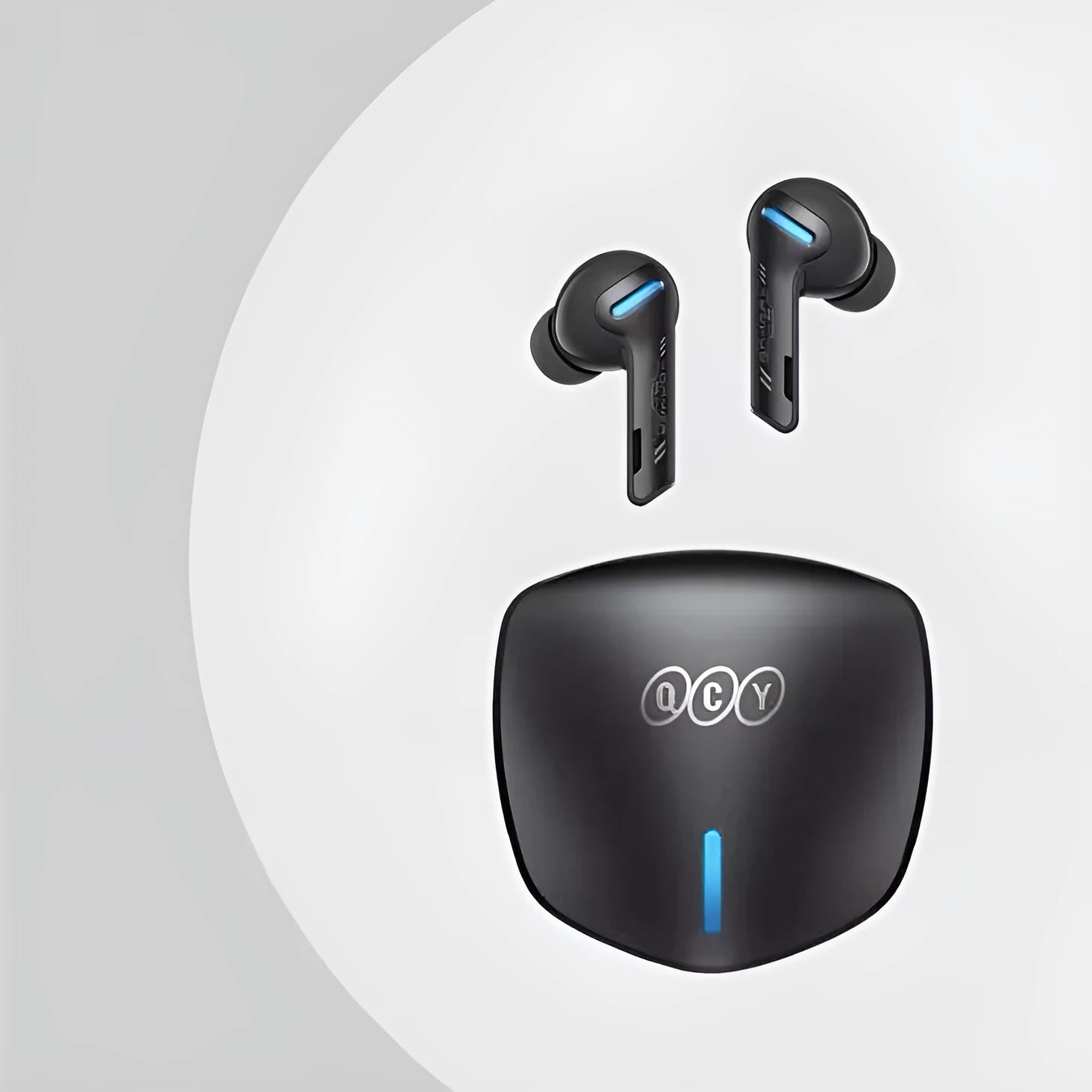 Grey QCY G1 wireless Bluetooth gaming earbuds with charging case and three sizes of silicone ear tips.