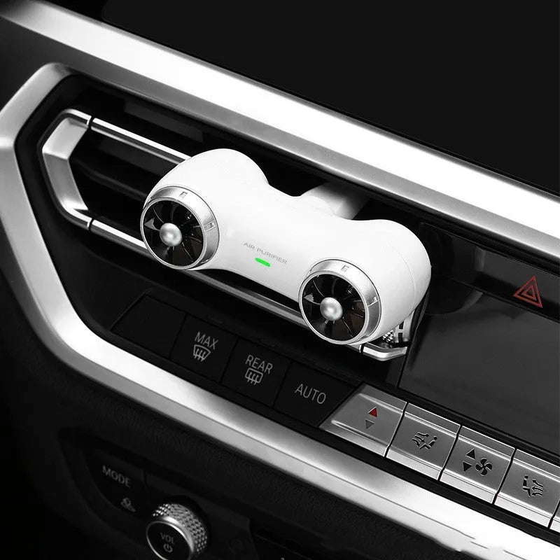 Compact black car air purifier with anion and aromatherapy functions for vehicle use