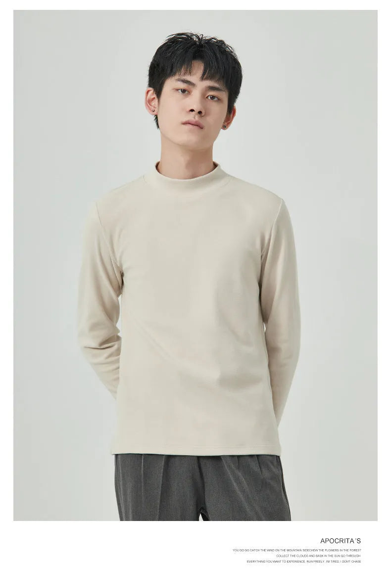 Men's solid colour half-high collar long sleeve t-shirt in Dralon fabric on a hanger.