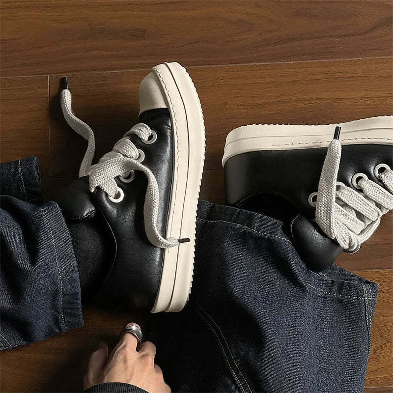 Men's black leather slip-on casual shoes with round toe and flat rubber sole