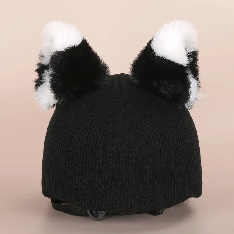 A soft plush cartoon hat decoration designed to cover a ski helmet, shown in one of 32 available colour styles.