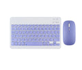 Girls Bluetooth keyboard in Lavender colour on a desk next to a tablet