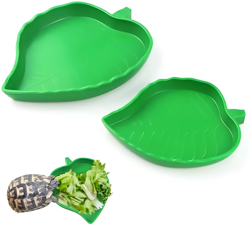 Two leaf-shaped reptile food and water bowls in green, large and small, on a white background.