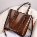 Genuine leather retro women's shoulder bag in horizontal square shape with three straps and sandwich pockets