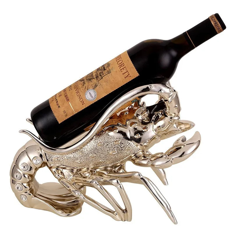 Lobster-shaped wine rack ornament in rose gold holding a wine bottle