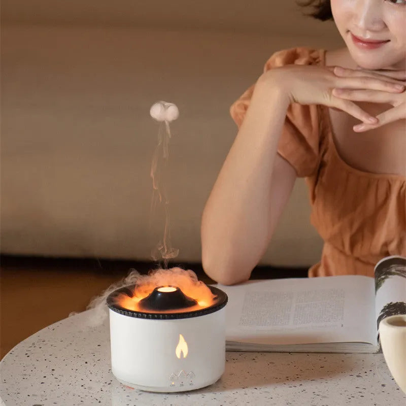 Round two-colour spray ring volcano humidifier with LED lights on a surface