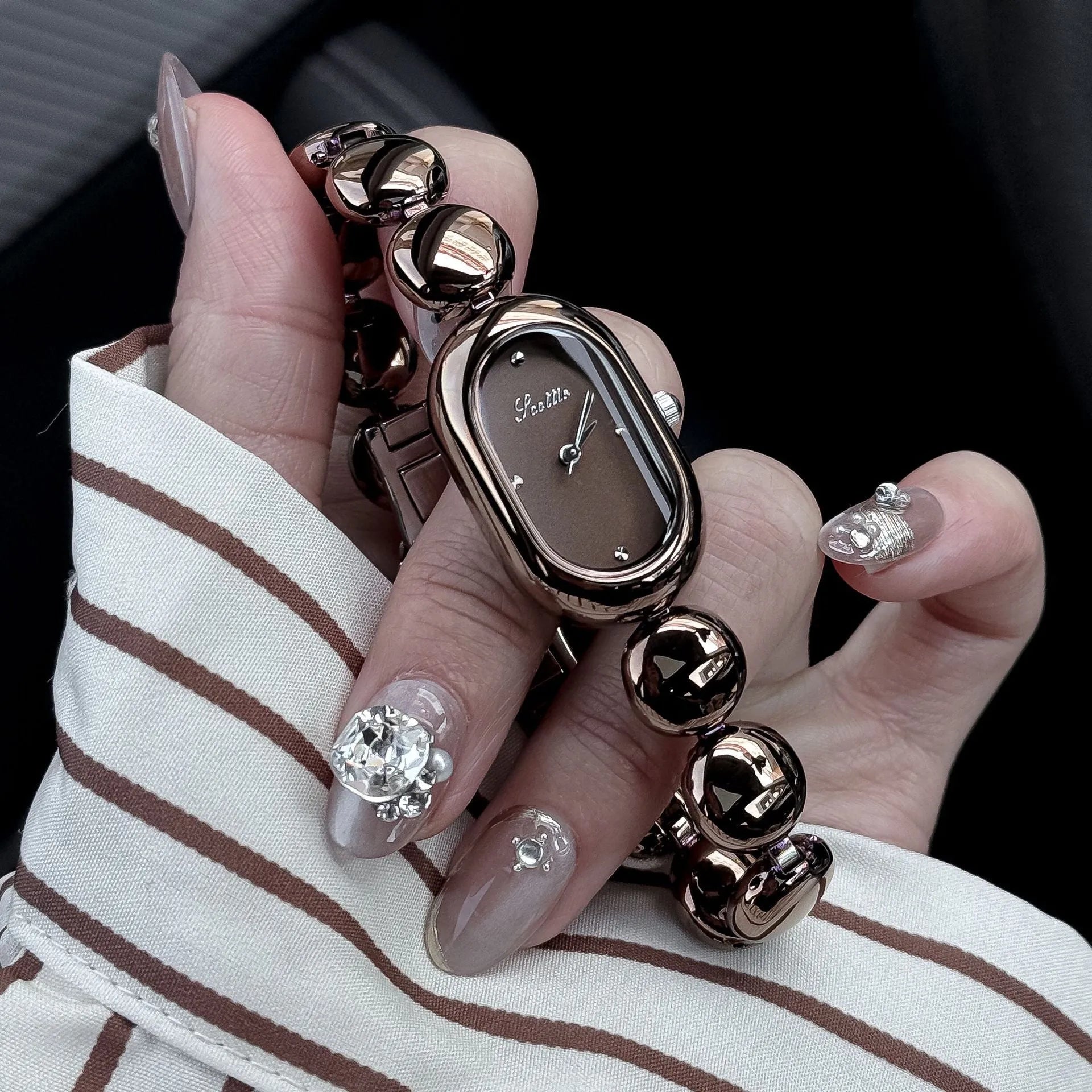 Women's oval gold-plated fashion watch in seven colour options with 9mm case thickness