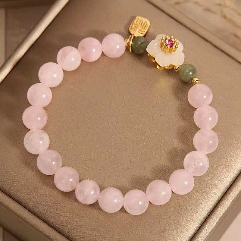 Crystal bracelet with peach blossom charms and polished Hetian jade beads in blessing card colours