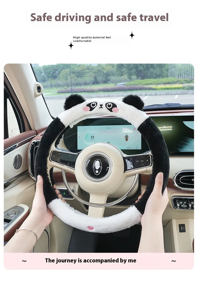 Plush thermal car steering wheel cover with embroidered cartoon panda design, shown fitted on a 38cm wheel.