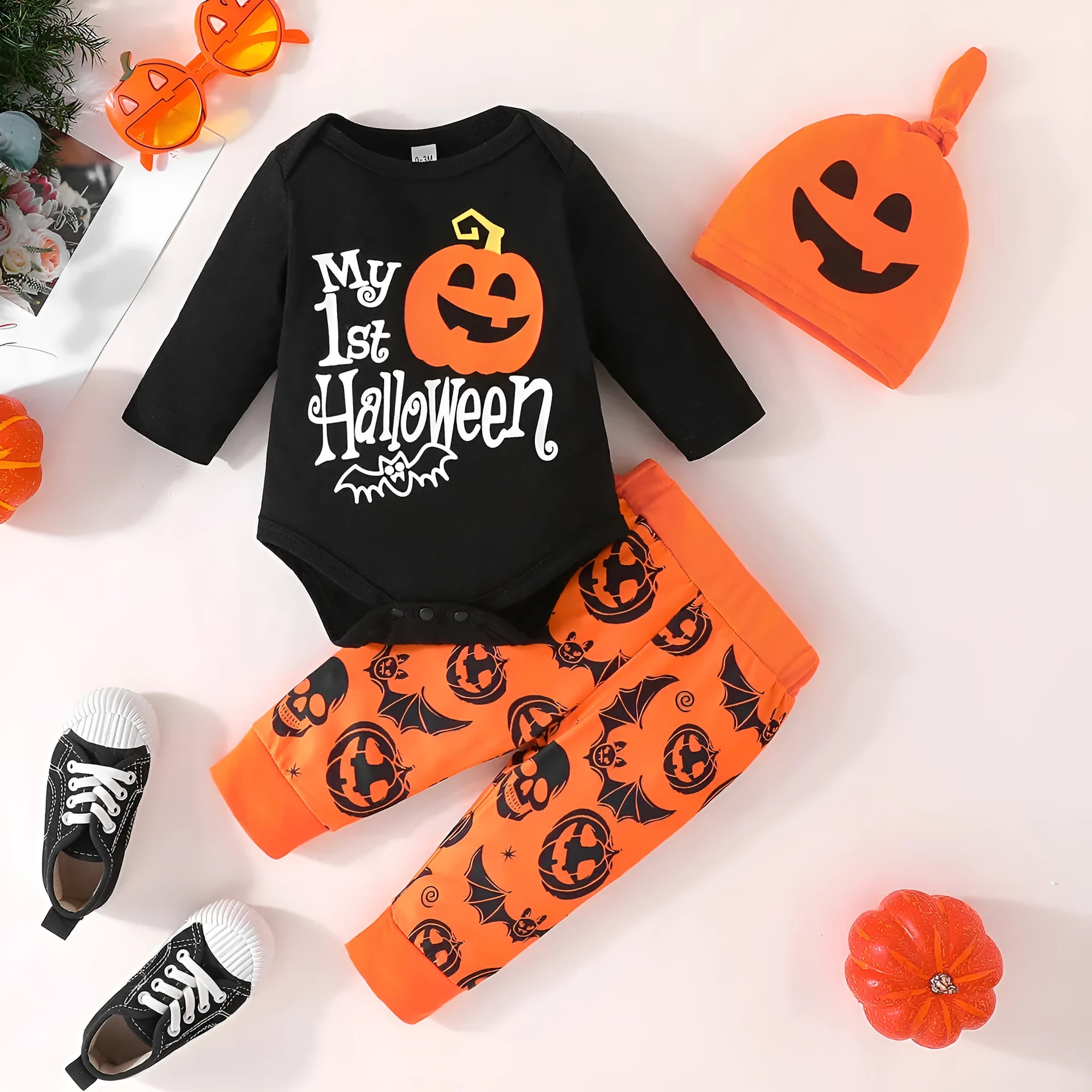 Baby Halloween letter print long-sleeve jumpsuit set with pumpkin trousers and removable hood hat on light background
