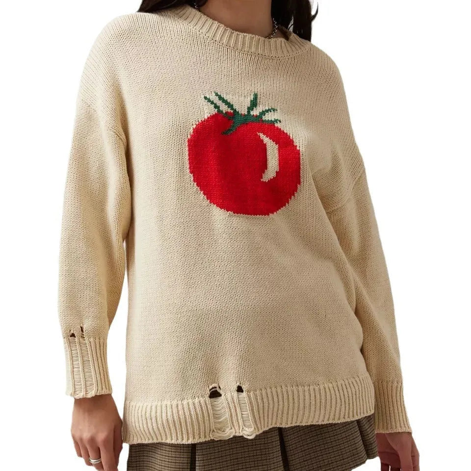 Milky white women's jacquard knit pullover sweater with a round neck and long sleeves on a hanger.