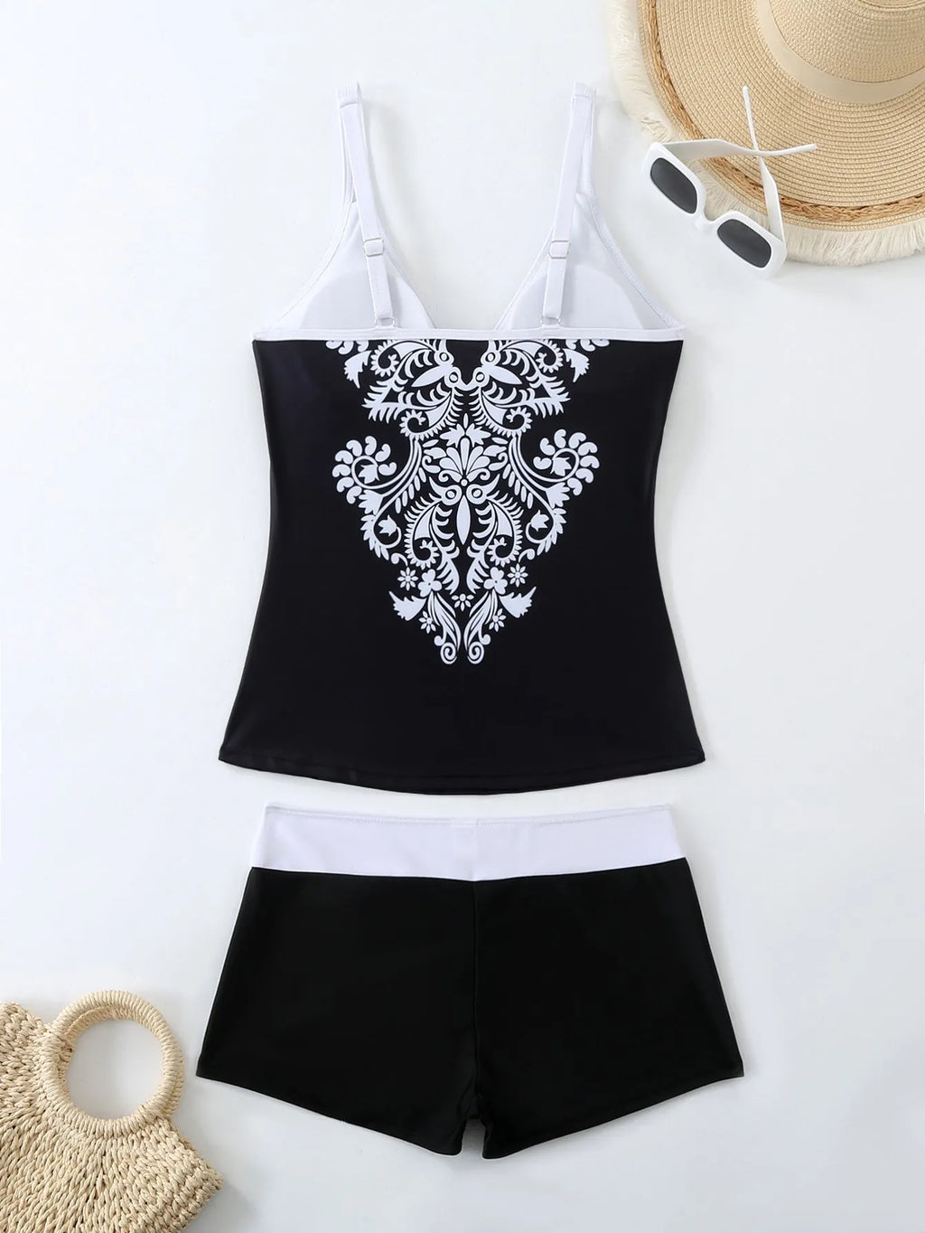 Plus size women's printed swim briefs in black or rose red with a cotton lining.