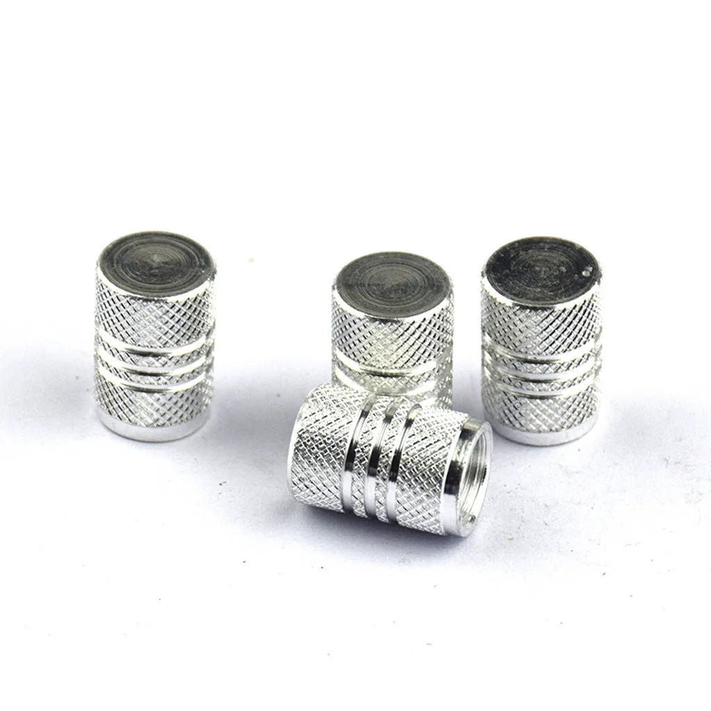 Set of aluminium alloy colour car tyre valve caps in various colours including red, blue, silver, and gold
