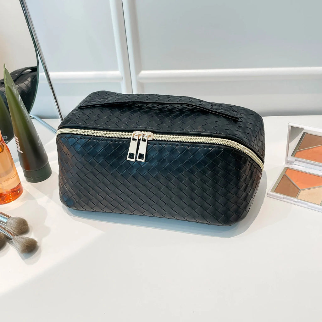 Waterproof large capacity multifunctional storage bag in pink, made from PU material, for cosmetics and daily use