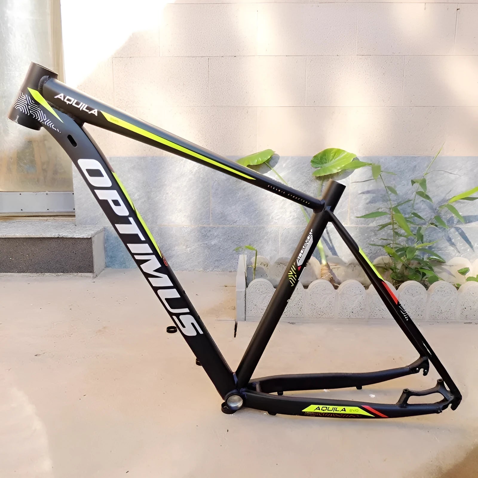 Black Green 29-inch aluminium alloy mountain bike frame showing disc brake mount and internal routing ports.