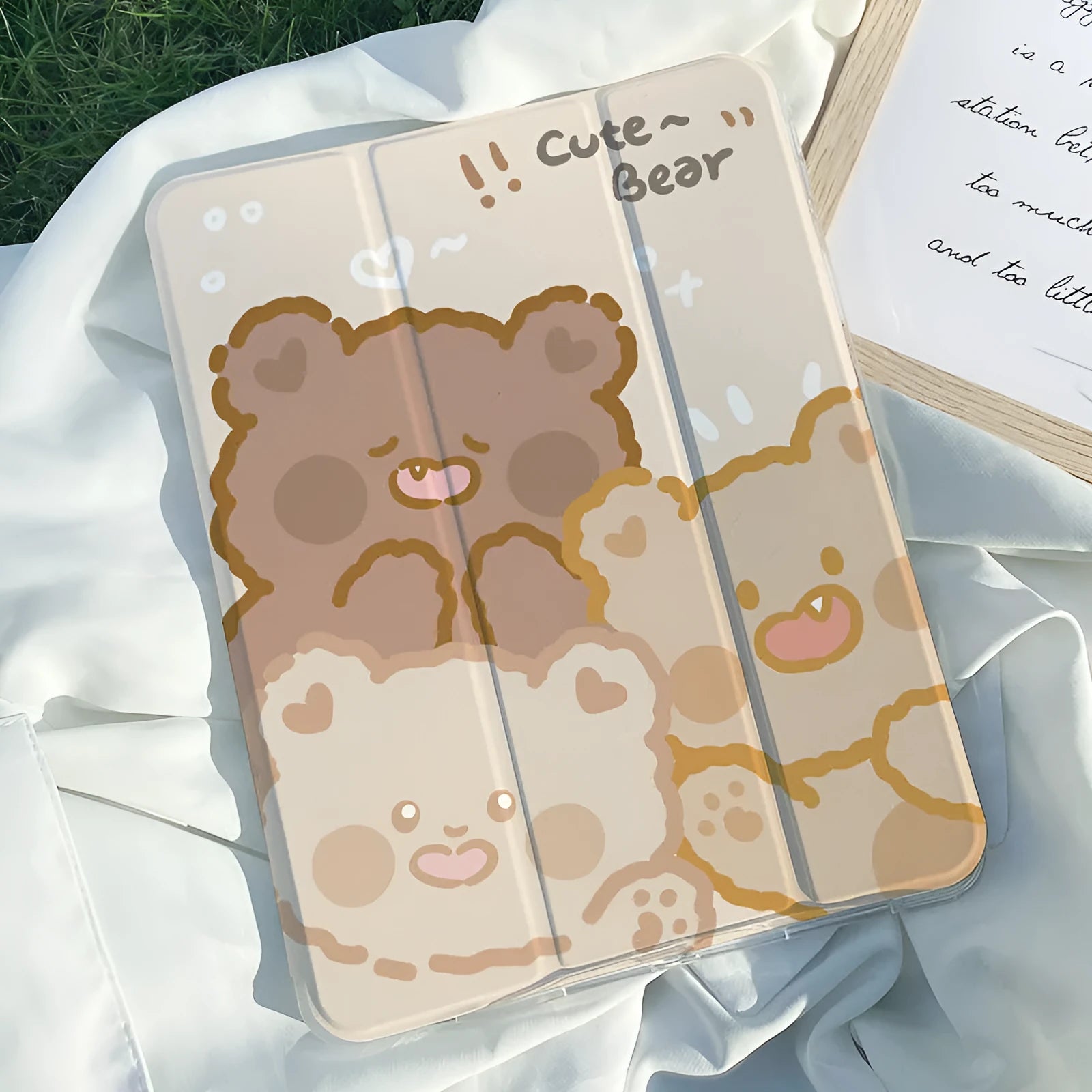 Silicone tri-fold protective iPad case in a cartoon rabbit design lying flat.