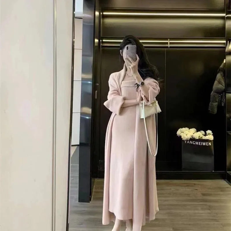 Women's grey knitted cardigan and long skirt suit set with flocking texture detail.