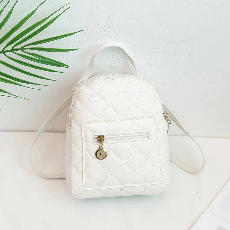 Girls' embroidered Korean style small hard backpack in black, shown with sandwich pocket.