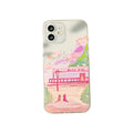 Soft silicone iPhone case with a cartoon design of two cats on the back.