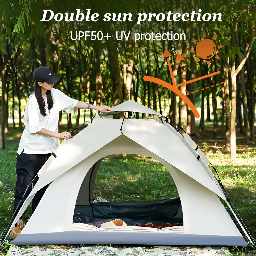 Beige fully automatic quick-opening double-deck outdoor tent set up on grass, with internal and external layers visible