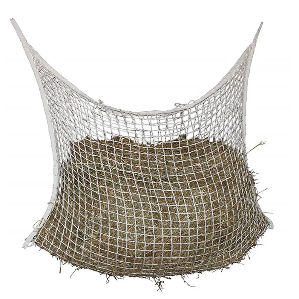 Black woven grid horse feeding bag hanging, showing its open structure and size.