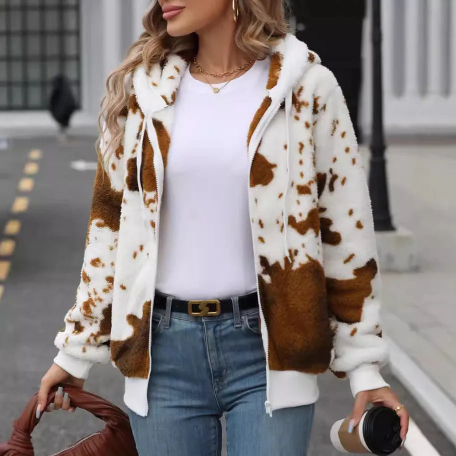 Yellow brown cow print hooded cardigan jacket with front zipper on female model