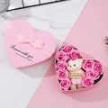 Red heart-shaped gift box containing soap roses for handwashing or bathing