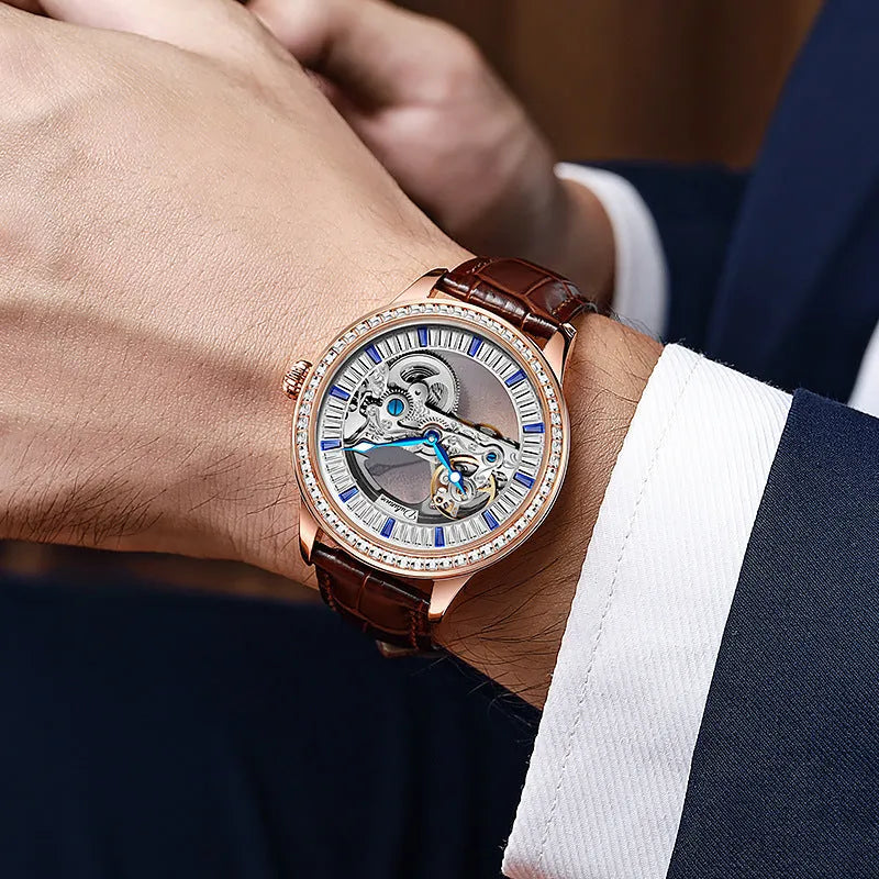 Men's zircon mechanical watch with stainless steel case and choice of strap on wrist.