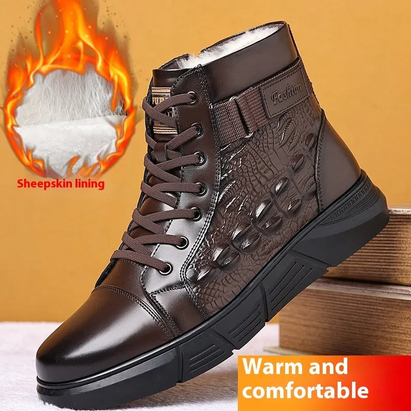Black fur-integrated genuine leather winter boots with rubber soles and front laces on a white background.