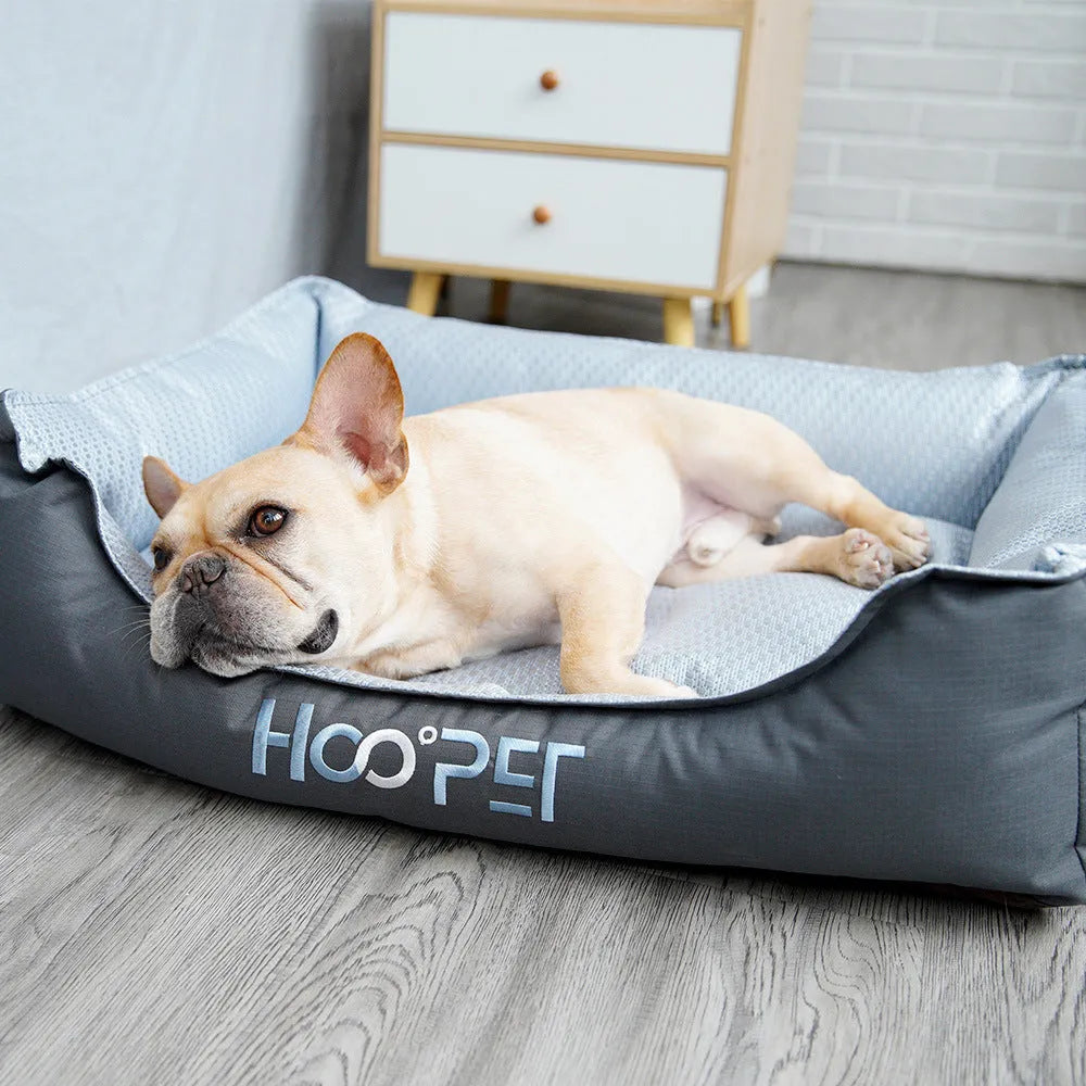 Soft grey pet bed with removable cover in small, medium, and large sizes for dogs and cats.